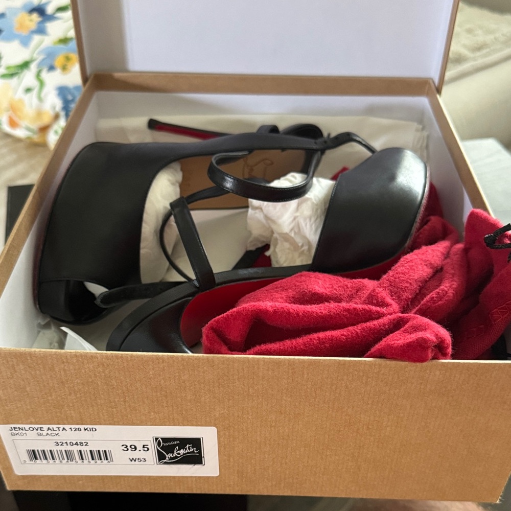 Christian Louboutin Black Heels with Red Soles